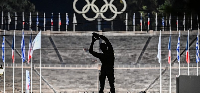 ATHENS HANDS OLYMPIC FLAME TO PARIS 2024 ORGANIZERS