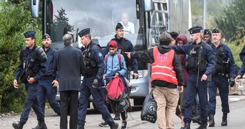 Police clear migrant camp in northern France