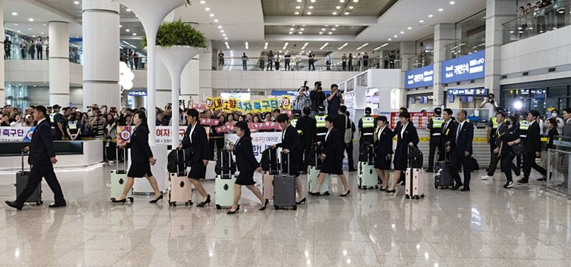 NORTH KOREAS WOMEN FOOTBALLERS ARRIVE IN SOUTH KOREA TO COMPETE FOR 1ST TIME IN 12 YEARS