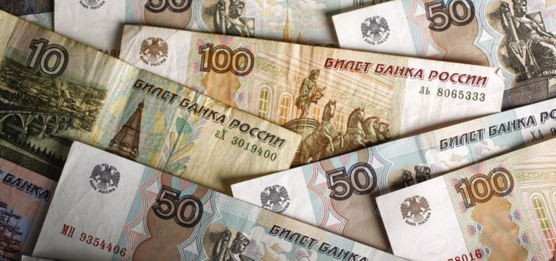 RUSSIAN ROUBLE FIRMS TO APPROACH FOUR-MONTH HIGH VS DOLLAR
