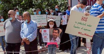 Palestinian protesters urge Israel to free boycott activist