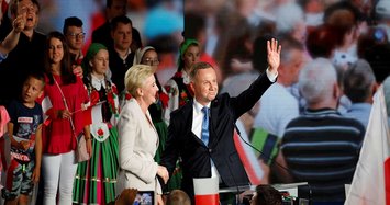 Polish president attacks LGBT rights as he heads to runoff