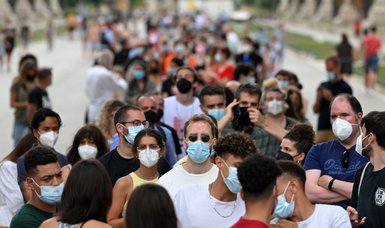 Spain makes face masks mandatory outdoors as cases rise