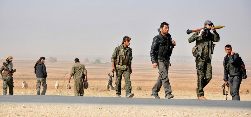 YPG SAYS AGREED WITH ASSAD REGIME TO FIGHT TOGETHER IN SYRIAS AFRIN